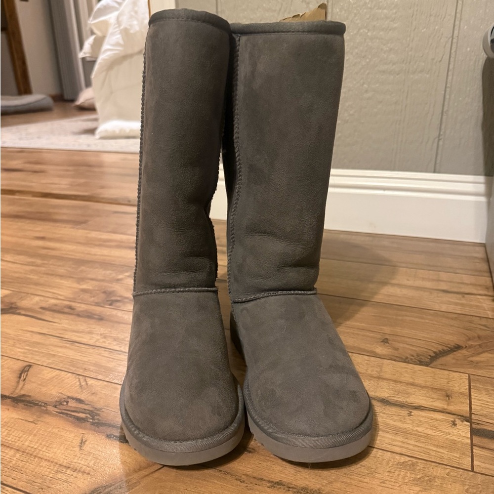 Uggs tall size W7.  Gray